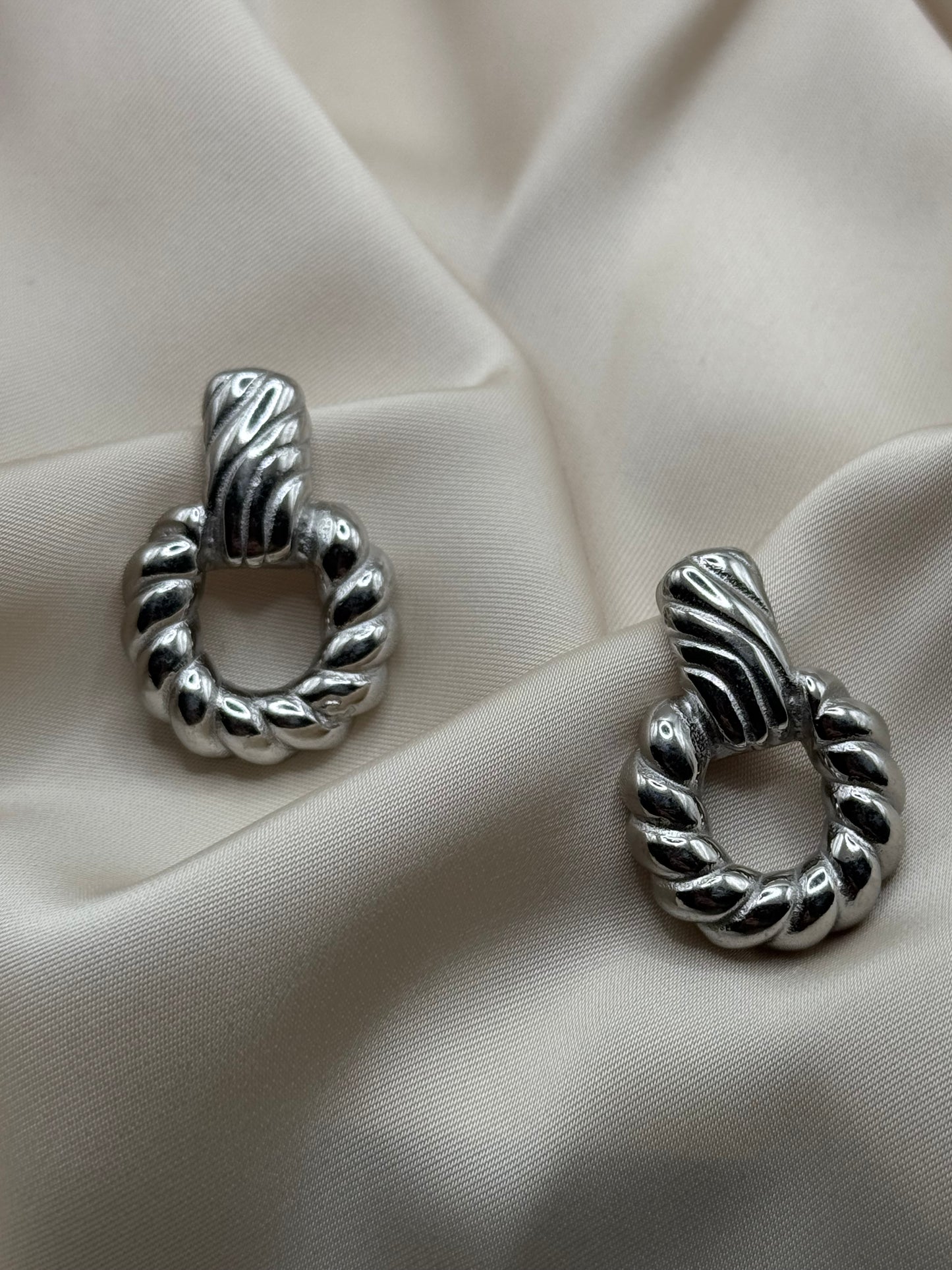 Virile earrings